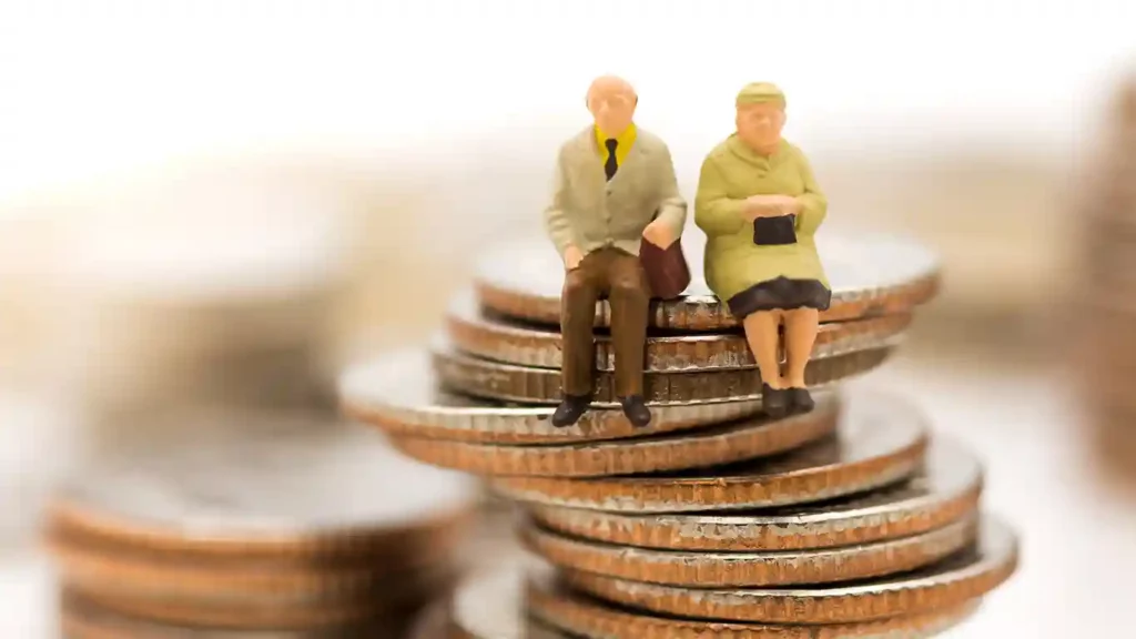 Weberg Law QDRO Miniature Couple Sitting on Coins